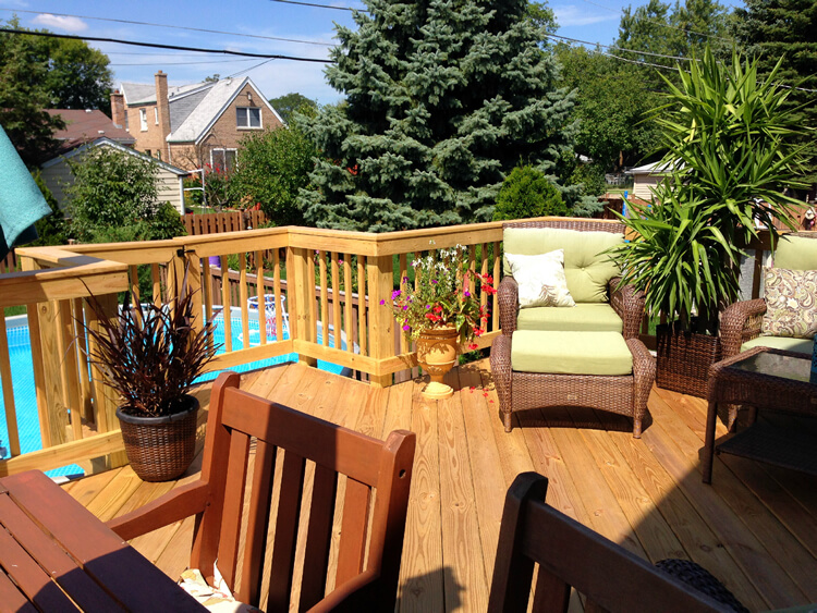 Custom wood deck with gate for pool