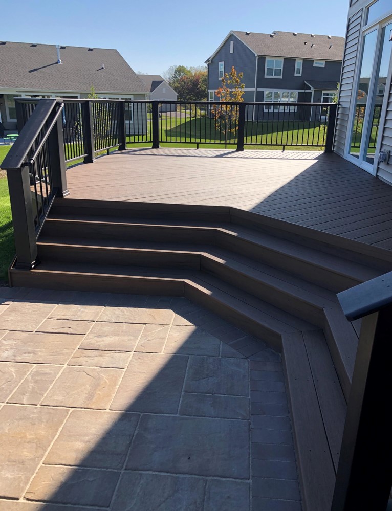 timbertech brown oak deck with belgard patio