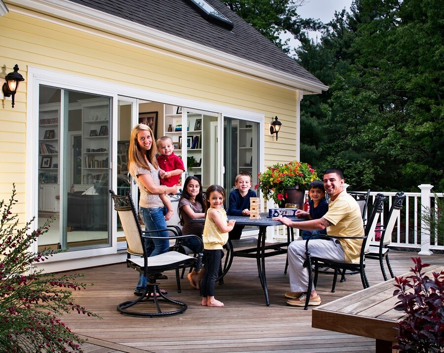 wood deck with family hanging out