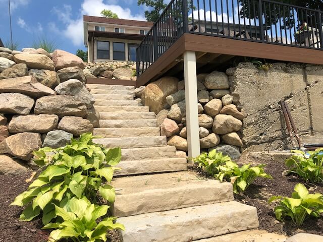 Trex composite deck built on sloping lakefront lot in Angola IN