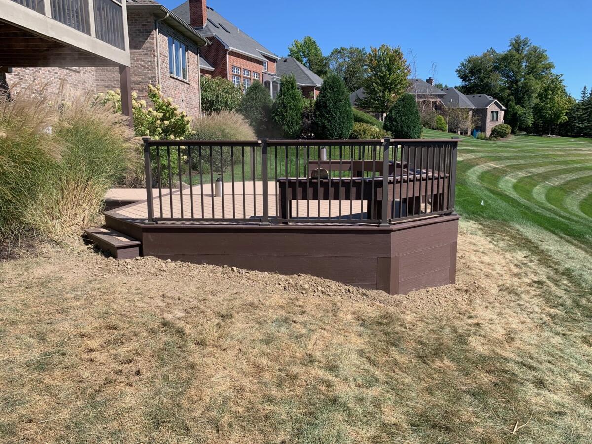 side view of sw fort wayne azek deck showing slope in yard