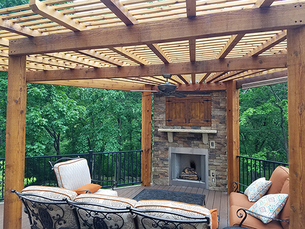 Deck with pergola and outdoor fireplace