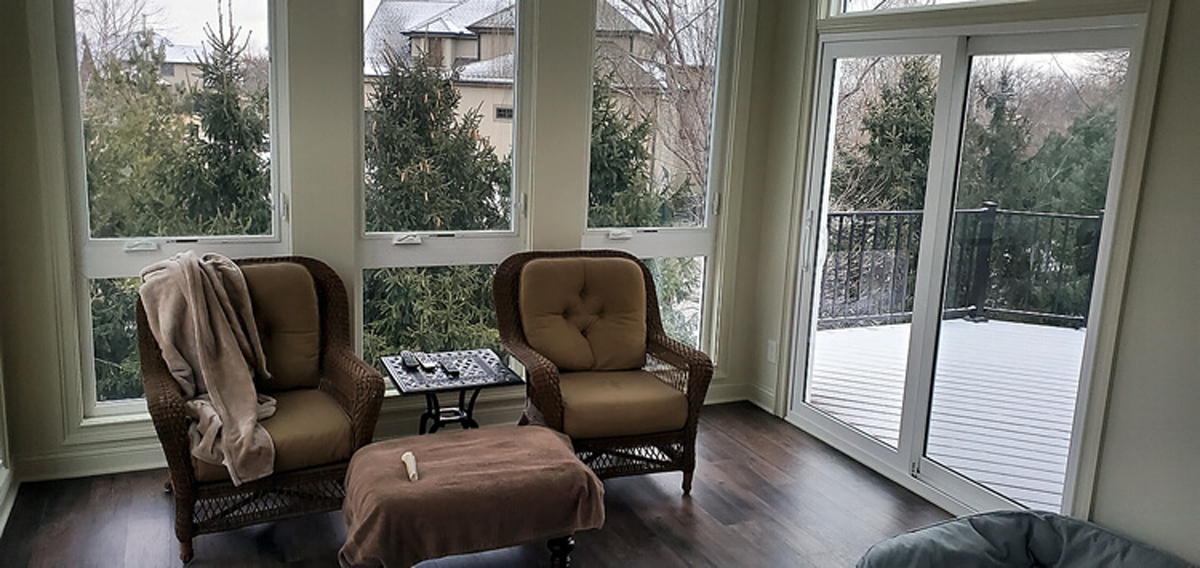 overland park sunroom with brown furniture