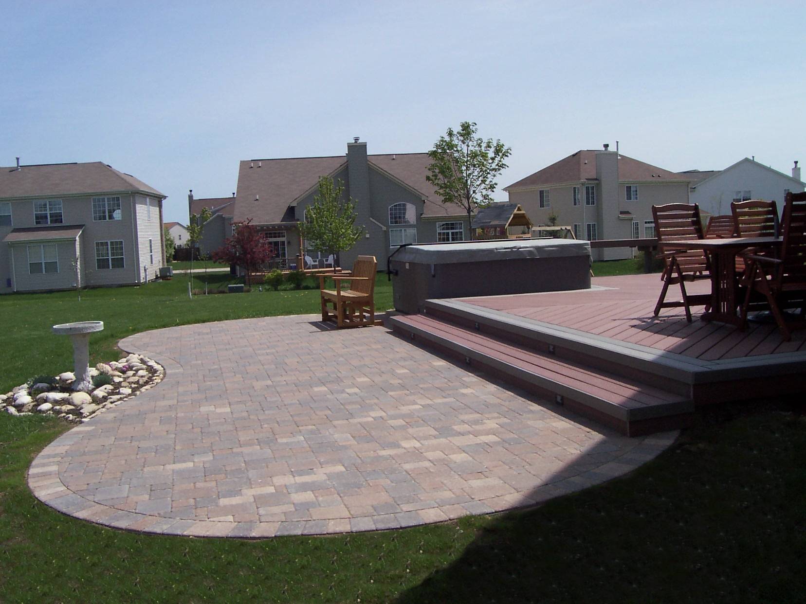 Composite deck with paver patio