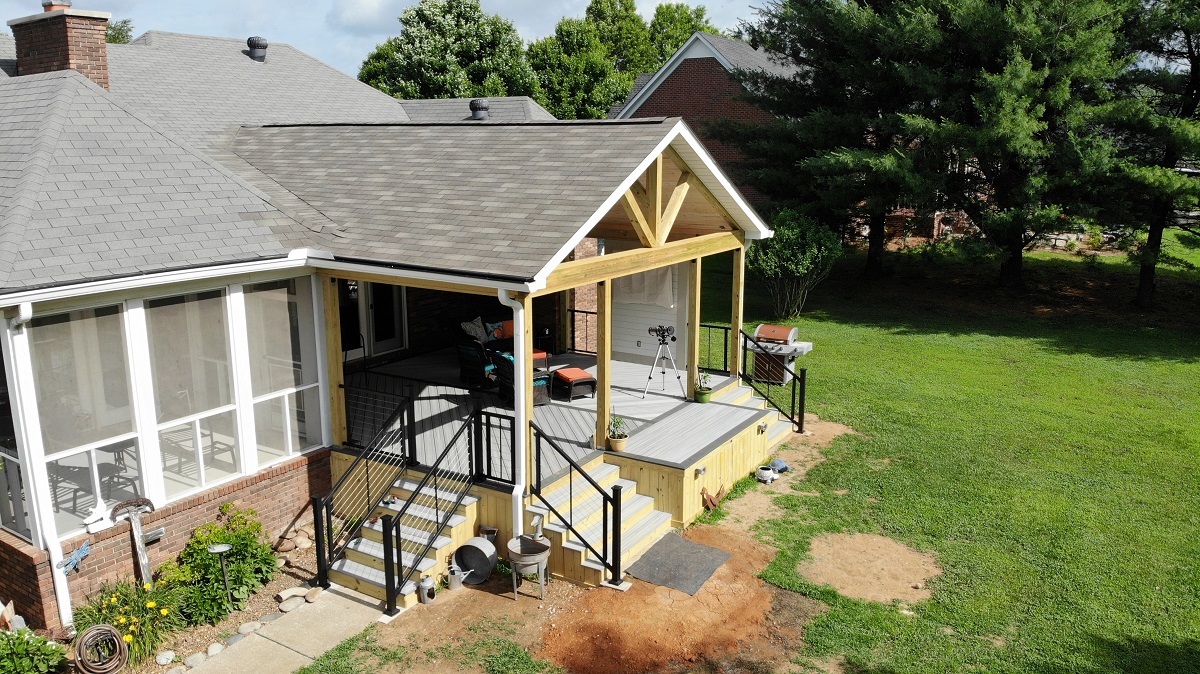 Side angle of covered porch and deck combination