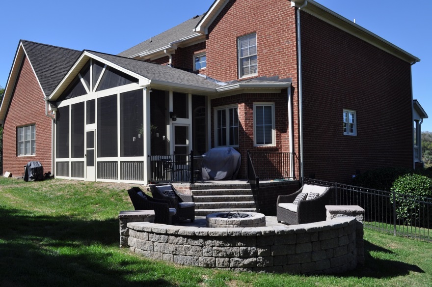 brick wood burning fireplace behind house