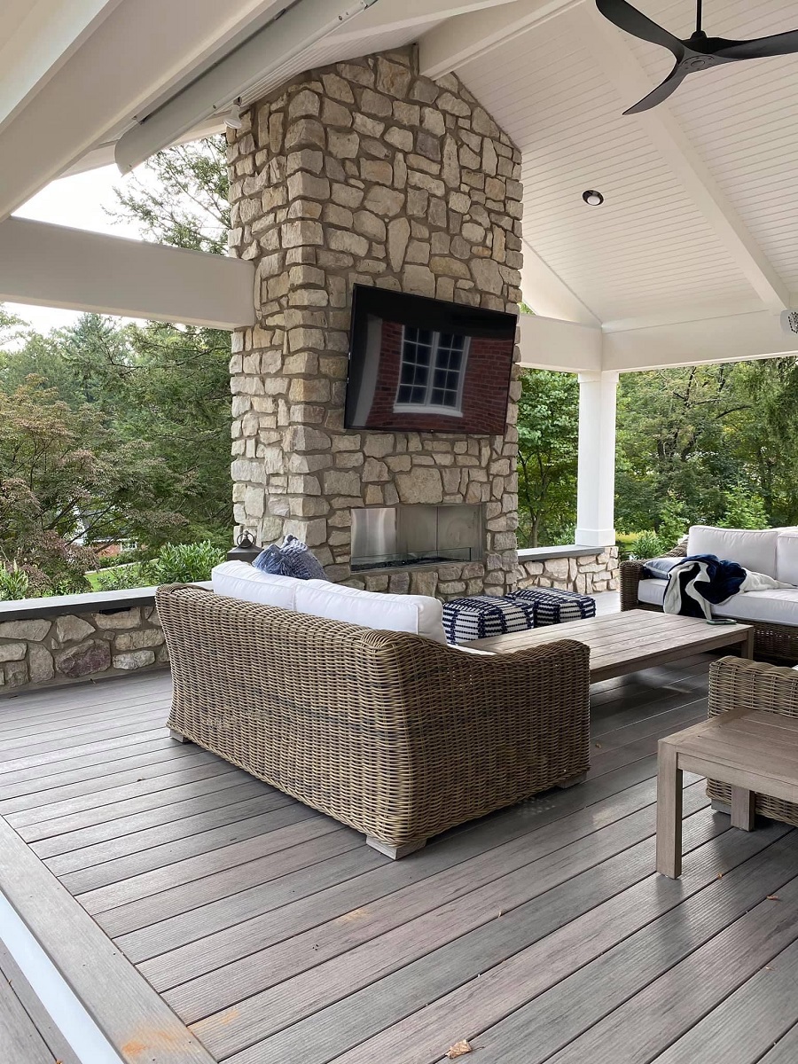covered porch with entertainment area