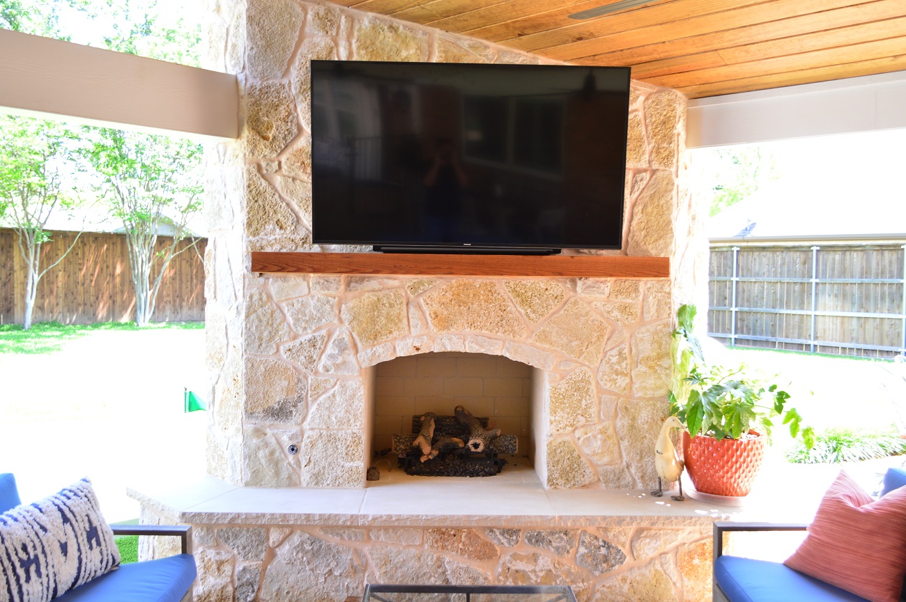 dreamy stone outdoor fireplace