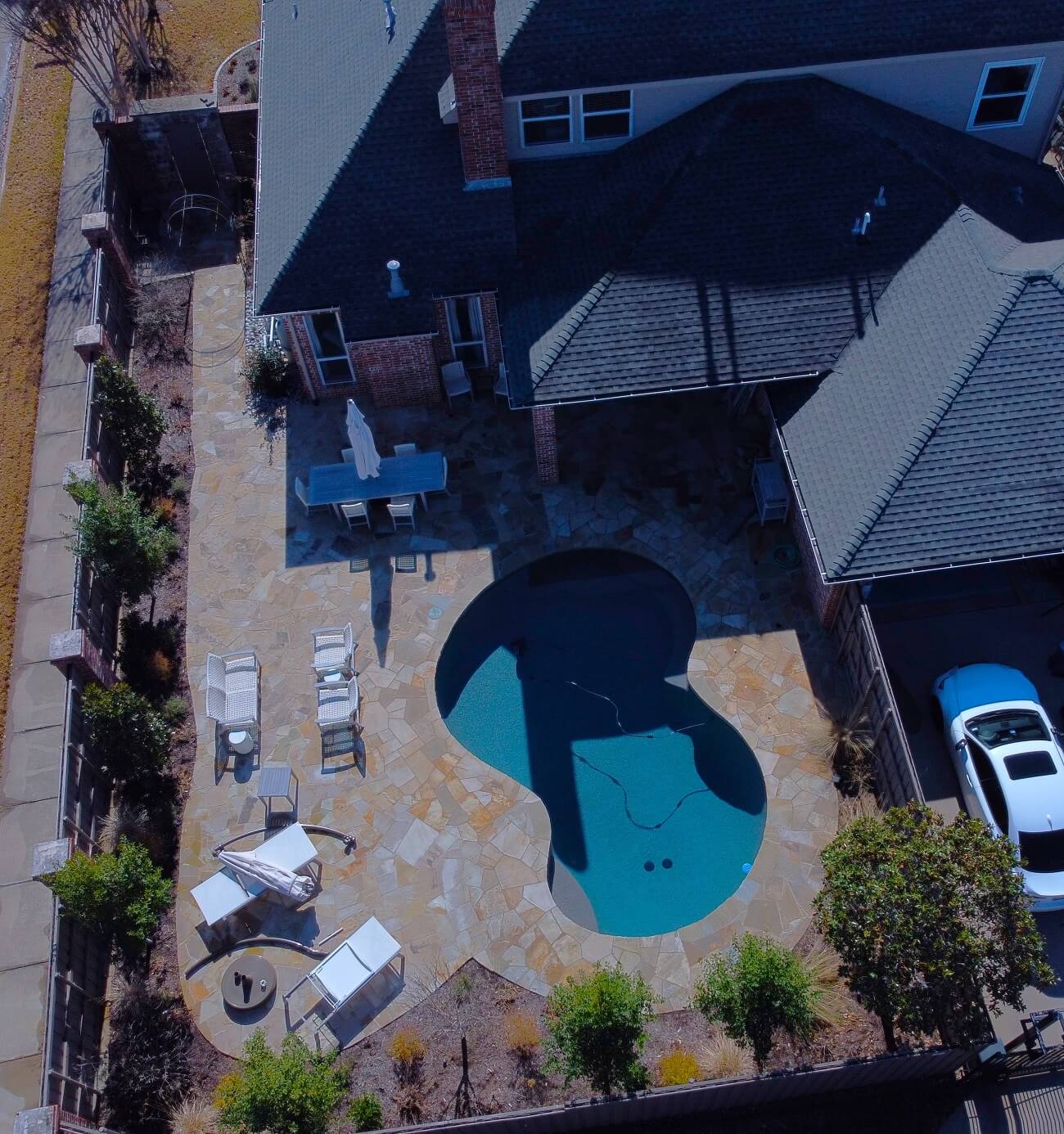 overheard view of flagstone pool surround in rowlett tx