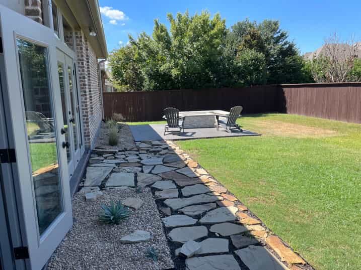 pathway down to fire pit area and seating wall
