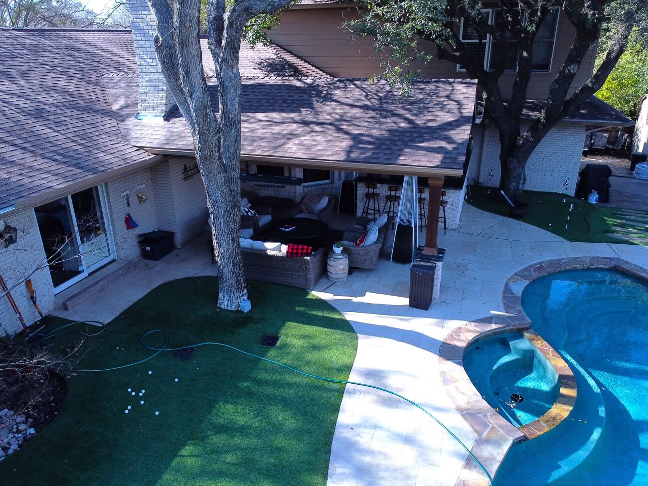 poolside patio cover with outdoor kitchen