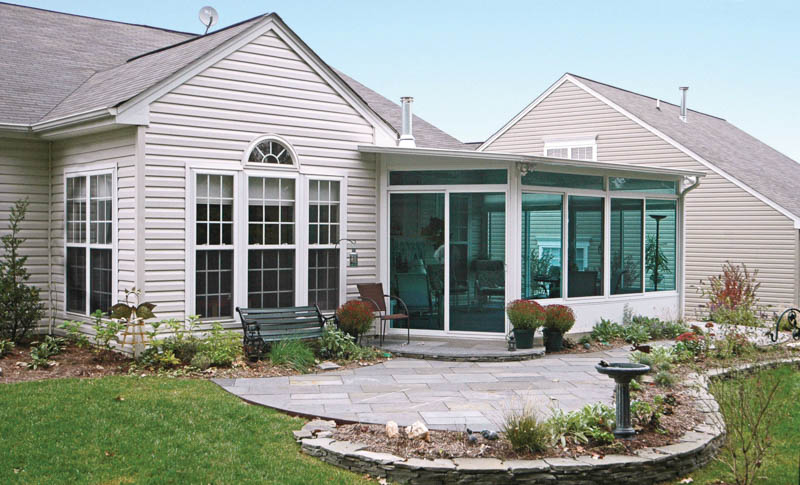 three season sunroom with entertainment area