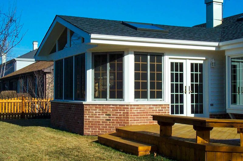 three season sunroom with entertainment area