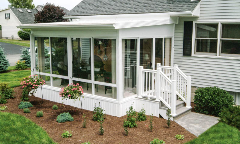 three season sunroom with entertainment area