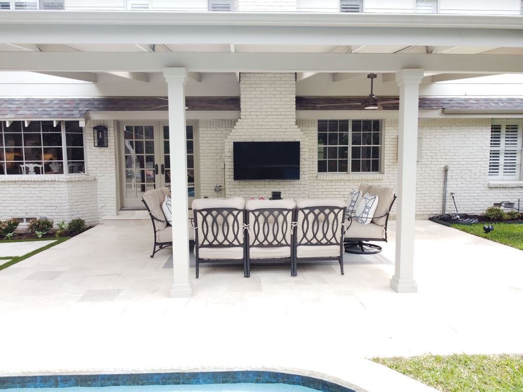 Travertine patio in Dallas takes center stage as part of this outdoor