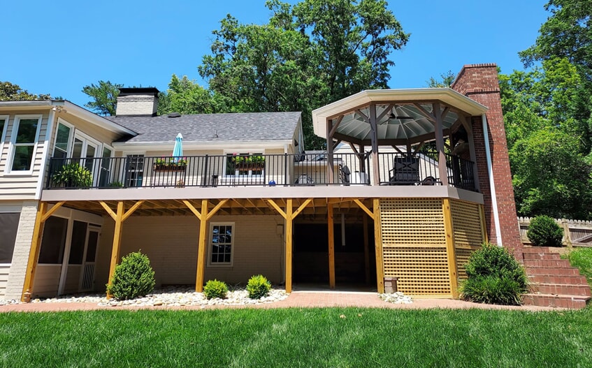 Custom Winston Salem deck with gazebo and outdoor fireplace by Archadeck