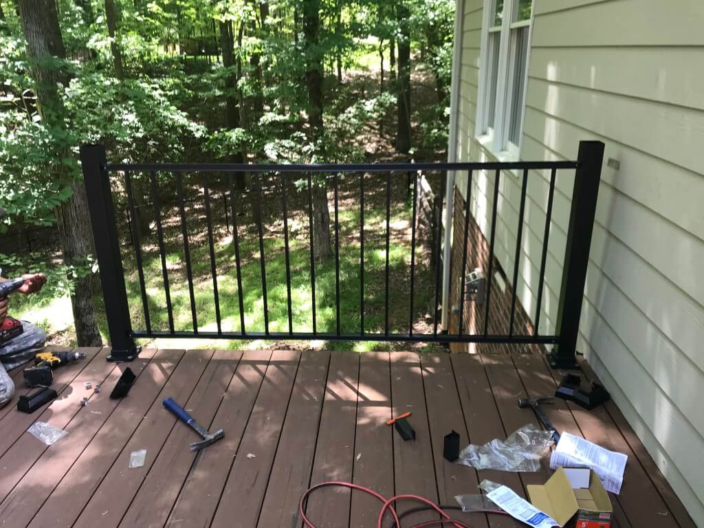 Man working on the railings