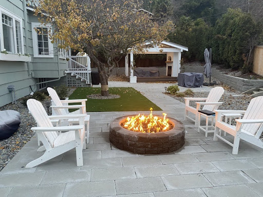 firepit with white chairs