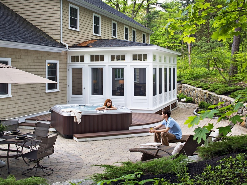 Spa deck with an outdoor hot tub