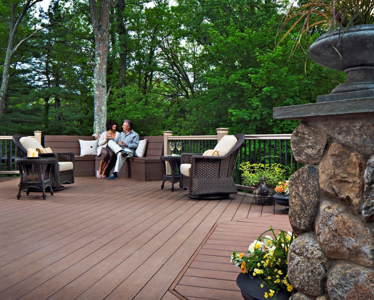 couple outside on patio with wine