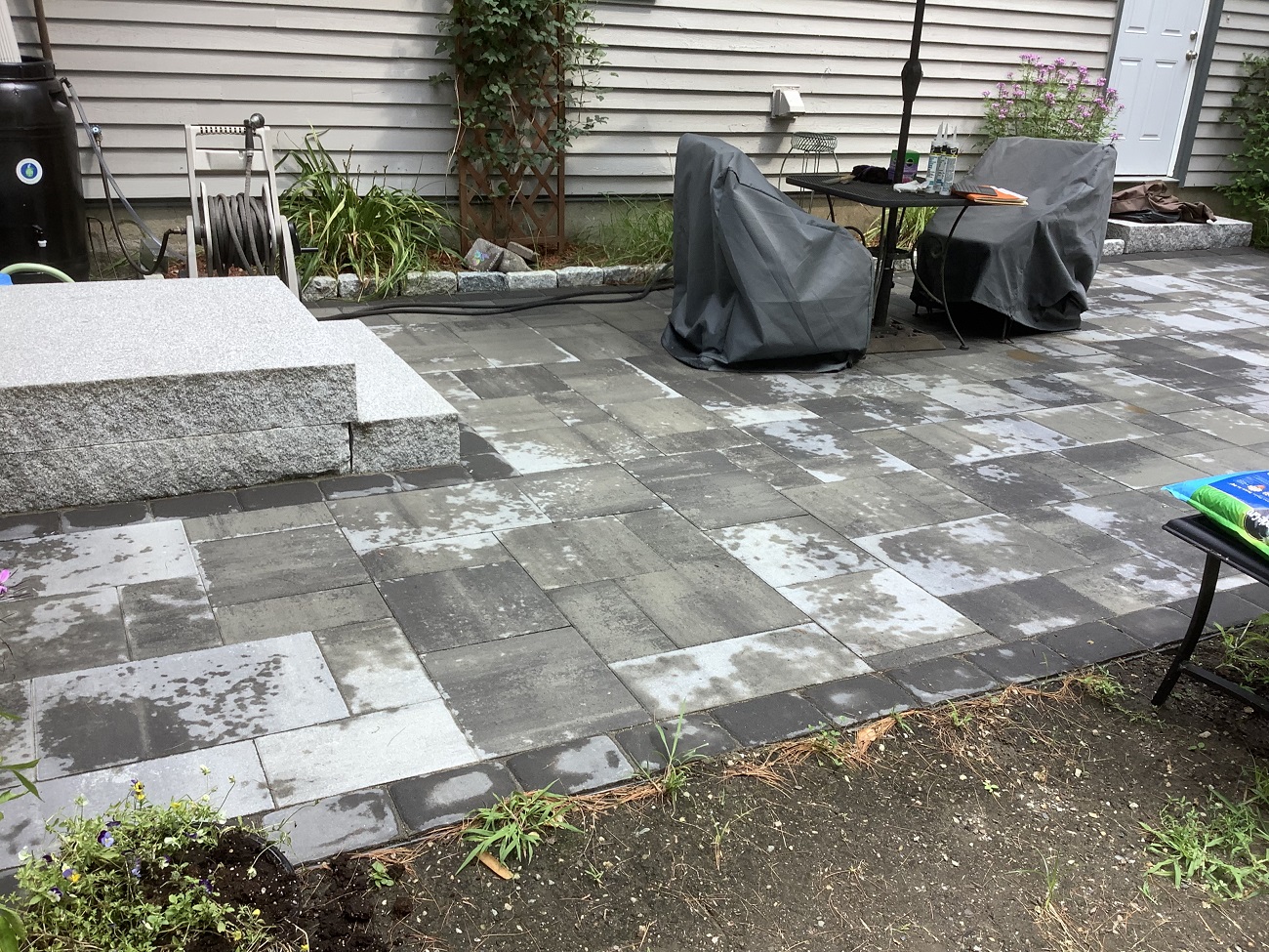 patio with a table and chairs on it