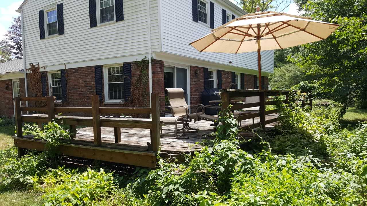 Before-the-old-deck-did-have-some-features-the-homeowners-liked