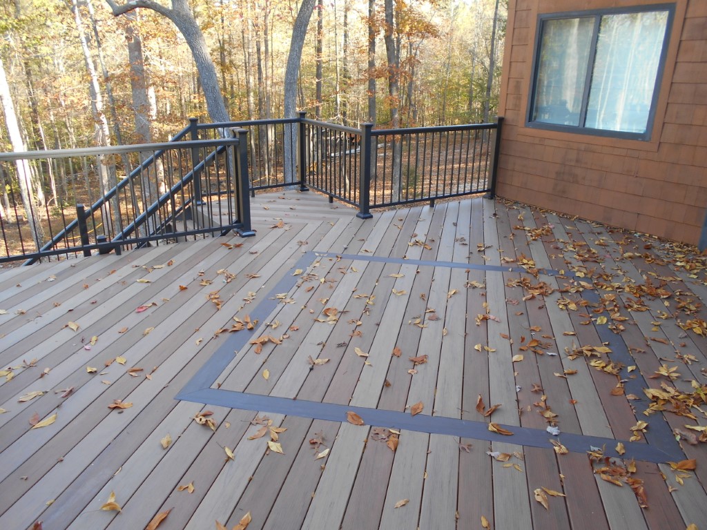 multi color composite deck with custom decorative inlay