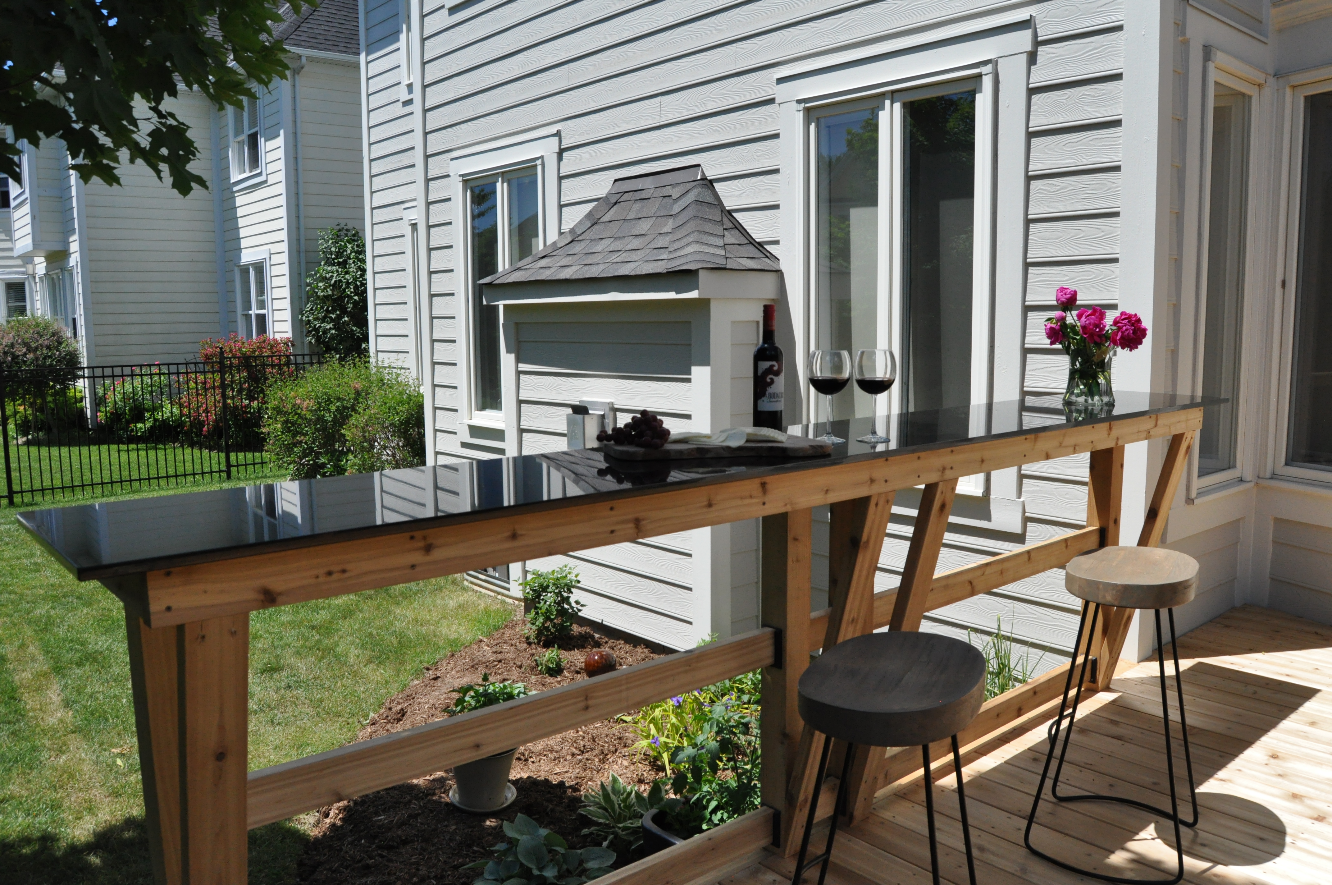 Granite top bar on cedar deck.