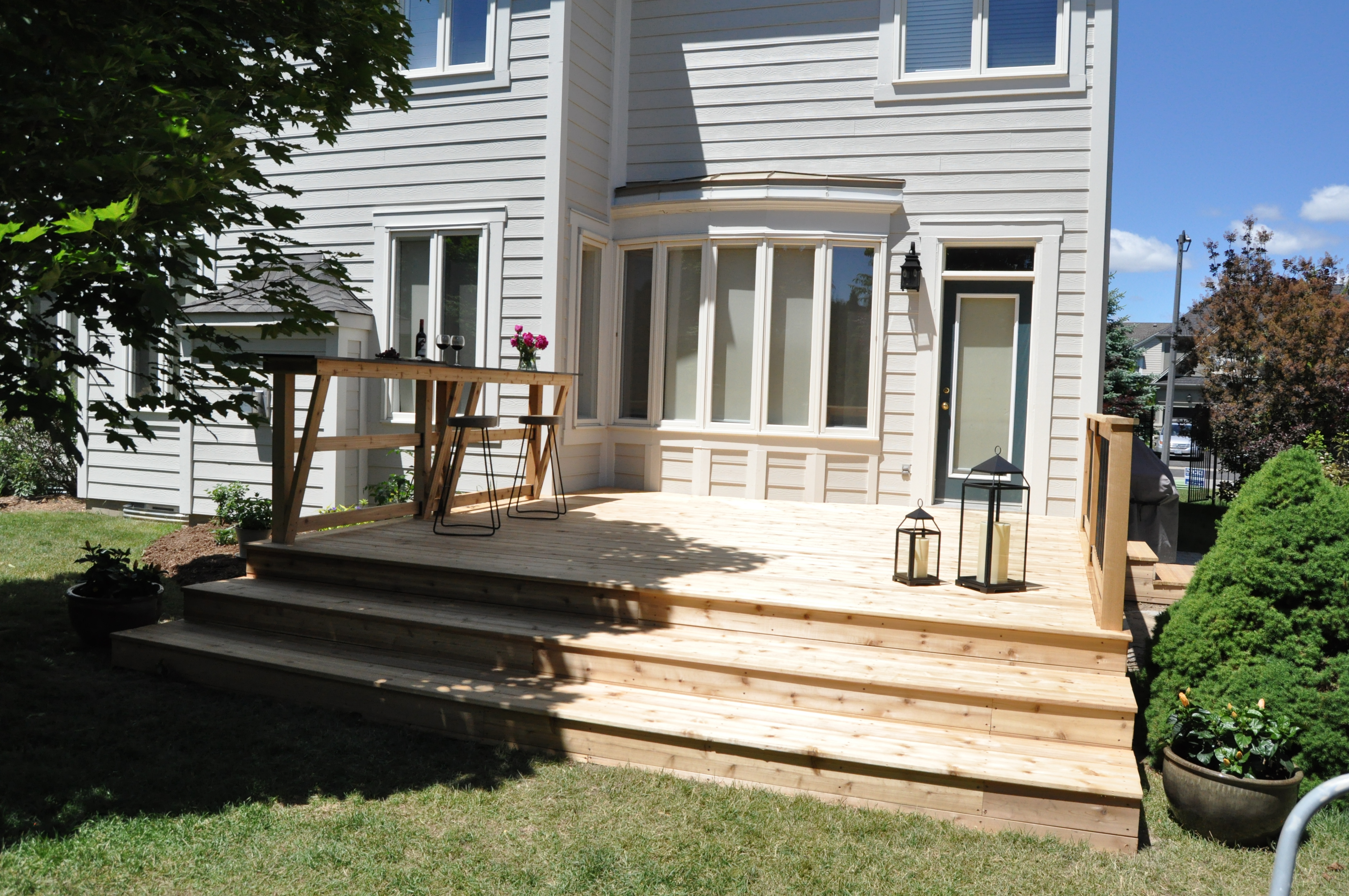 Cedar deck with granite top bar. 