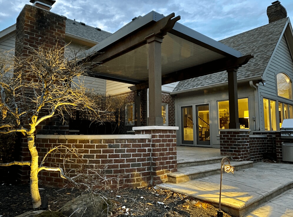 Louvered pergola on existing wood pergola